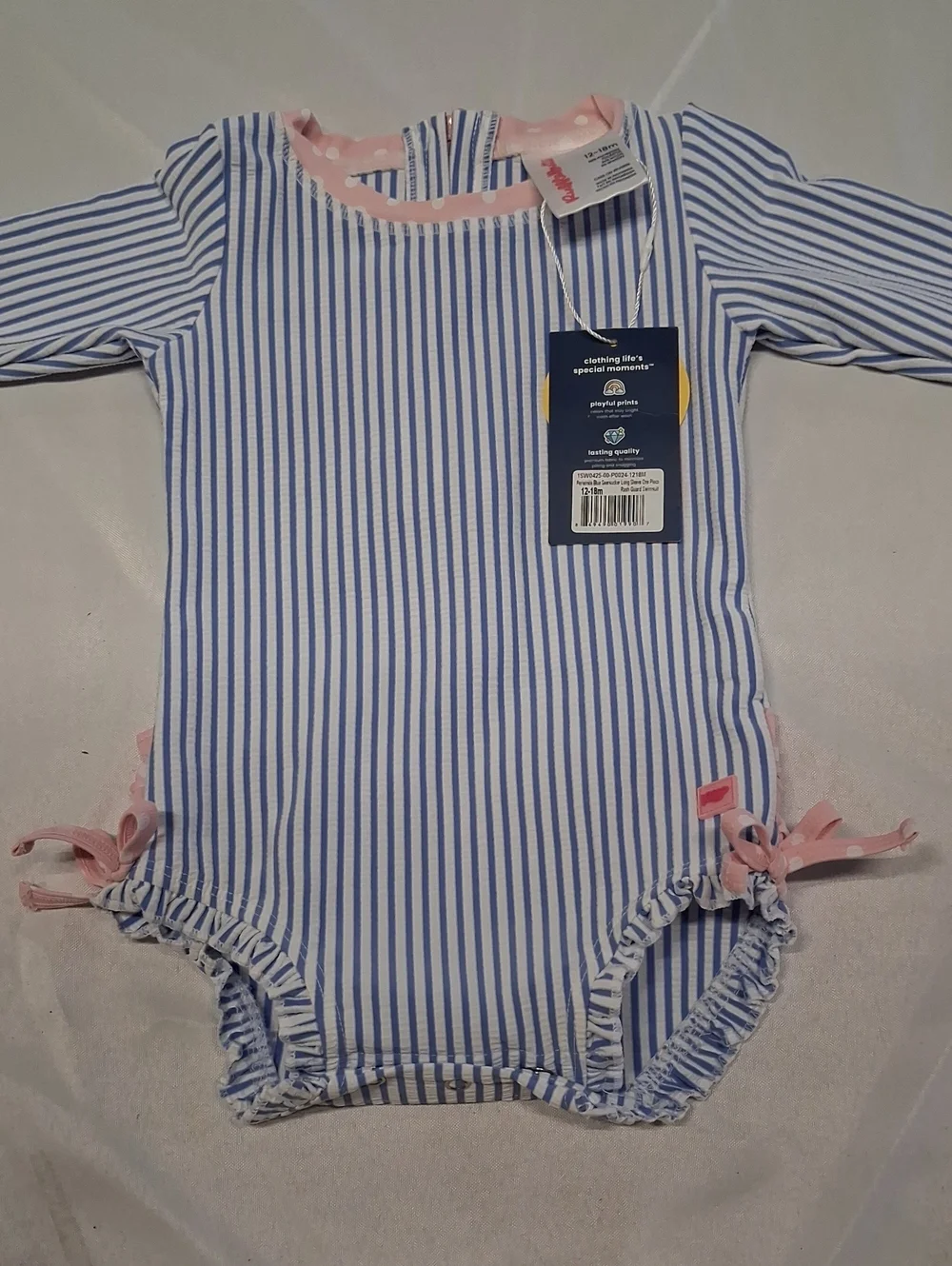 NWT RuffleButts Blue and White Striped Baby Swimsuit with Pink Tag
